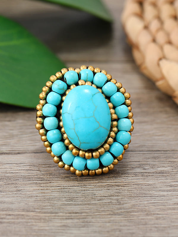 Anillo tejido turquesa