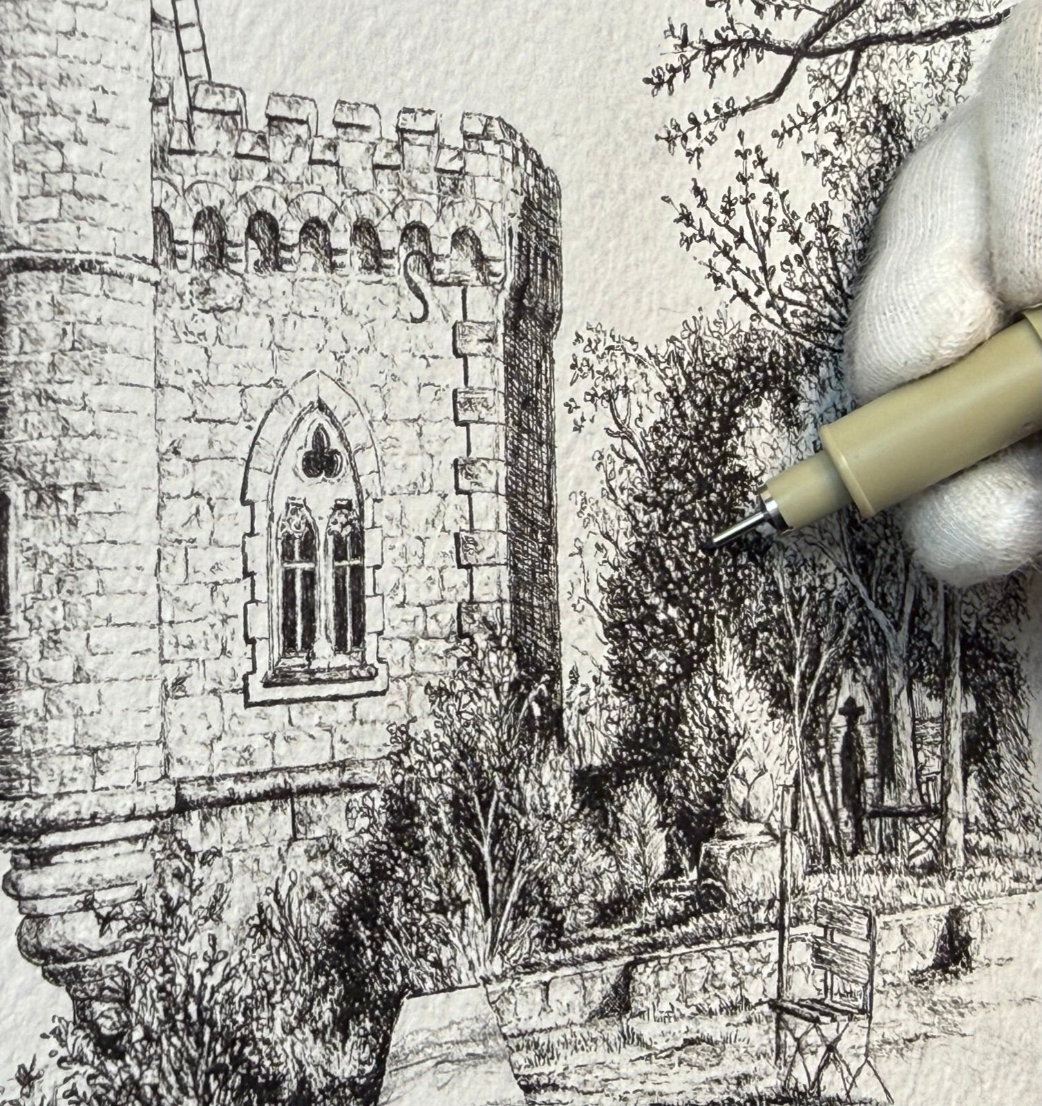 Close-up of Agus Sánchez drawing with an archival fineliner, gloved hand over hatched ink lines